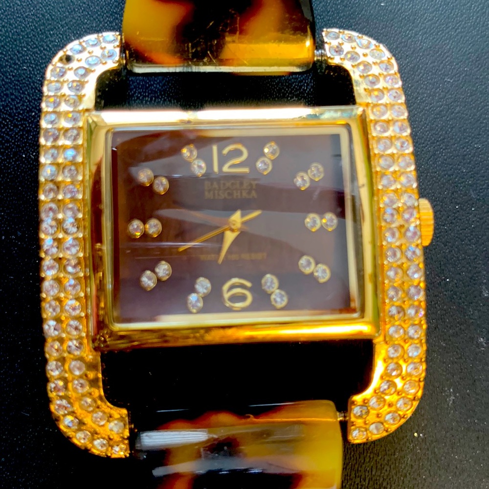 Badgley Mischka tortoise shell watch surrounded in Rhinestones and gold tone